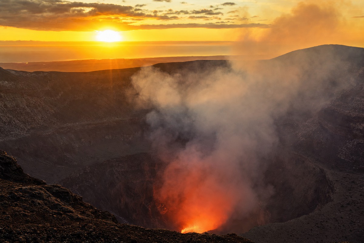 Clear dry-season night sky over the glowing Santiago Crater at Masaya Volcano