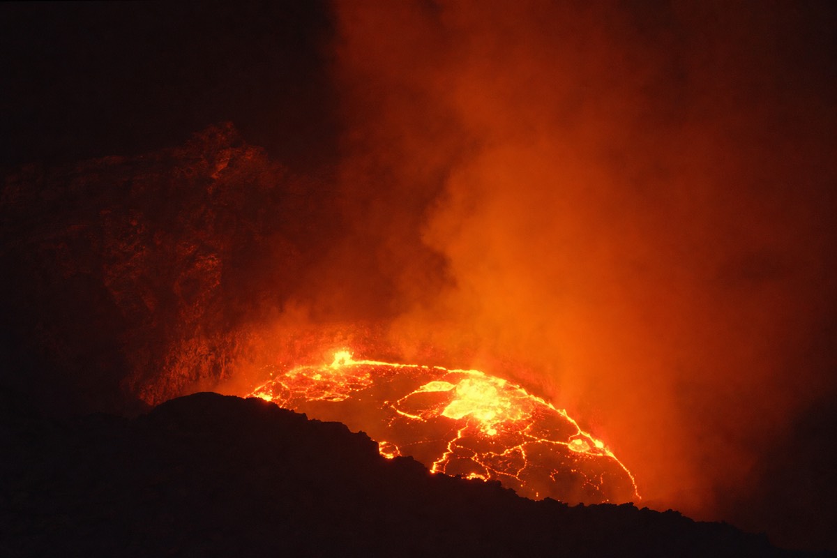 The glowing lava lake inside Santiago Crater at Masaya Volcano after dark