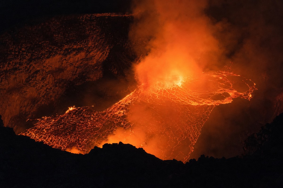 The glowing lava lake inside Santiago Crater